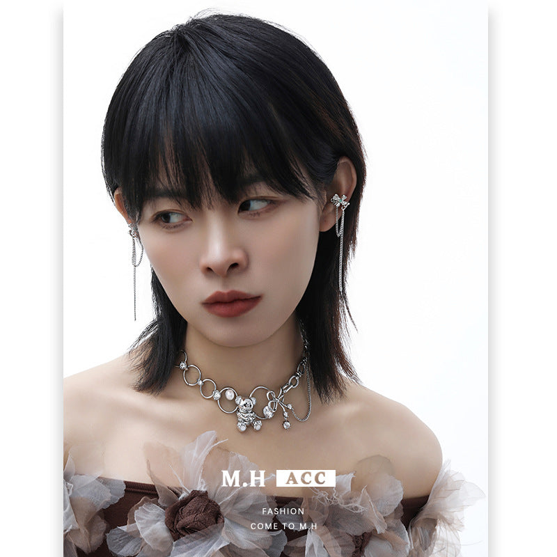 Four-leaf clover fringed ear bone clip long feeling Japanese and Korean personality trend sweet and cool ins light luxury earrings women's wholesale