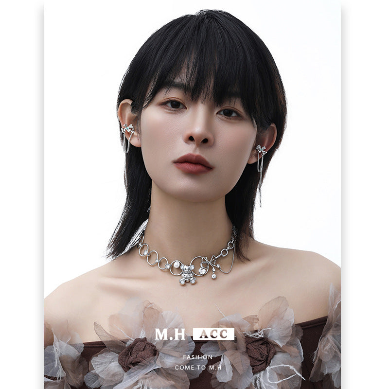 Four-leaf clover fringed ear bone clip long feeling Japanese and Korean personality trend sweet and cool ins light luxury earrings women's wholesale