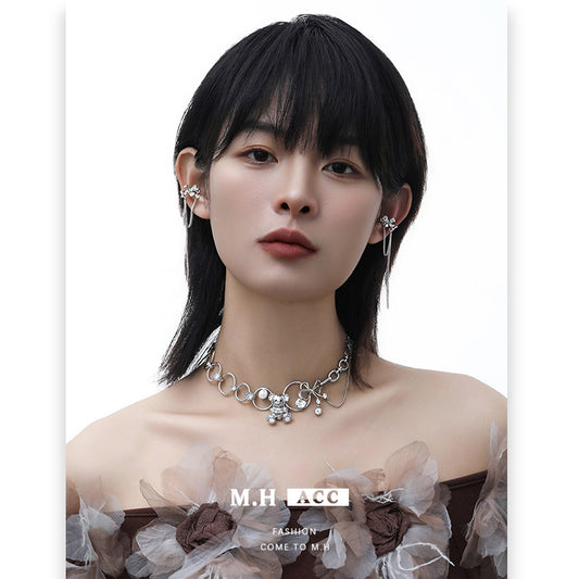Four-leaf clover fringed ear bone clip long feeling Japanese and Korean personality trend sweet and cool ins light luxury earrings women's wholesale